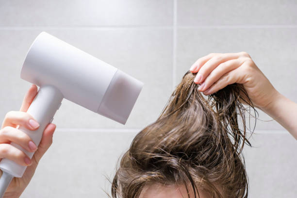 Does using conditioner while blow drying damage your hair?