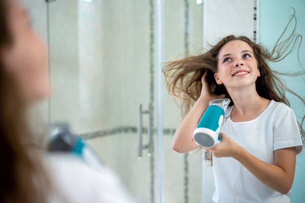 How can I blow dry my hair every day without damaging it?